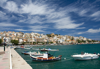 Image showing Sea bay, promenade in Mediterranean town and cirrus clouds