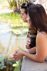 Image showing Attractive Hispanic Couple Overlook Pond