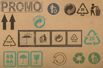 Image showing different symbols from cardboard boxes 