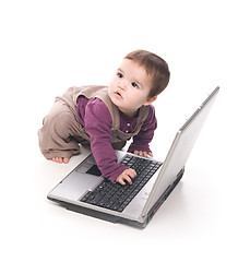 Image showing Baby girl with a laptop