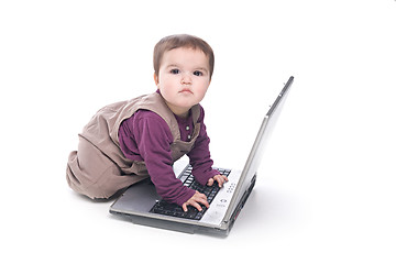 Image showing Baby girl with a laptop