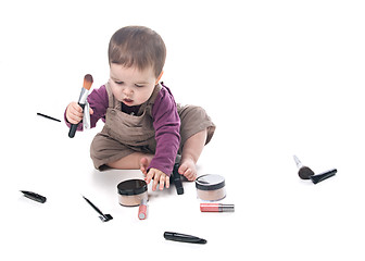 Image showing Baby girl with cosmetics