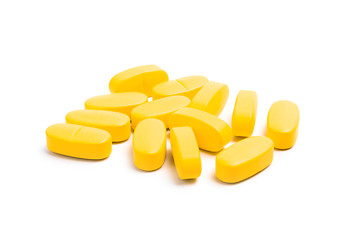 Image showing yellow vitamin pills