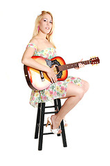 Image showing Blond girl with guitar.