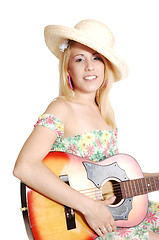 Image showing Blond girl with guitar.