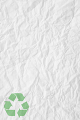 Image showing white crumpled paper and recycling sign