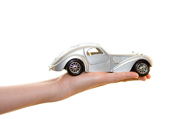 Image showing Car toy on palm