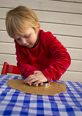 Image showing Making gingerbread cookies