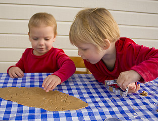 Image showing Making gingerbread cookies