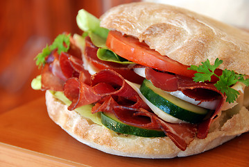 Image showing Appetizing sandwich with ham and vegetables