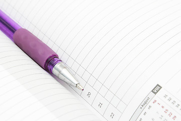 Image showing A diary and a pen