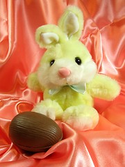 Image showing Easter bunny with chocolate egg