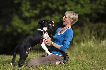 Image showing Woman with dog