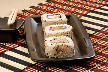 Image showing Sushi and chopsticks