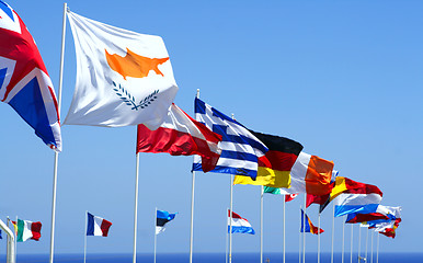 Image showing Flags of the EU against blue sky