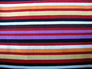 Image showing Colorful striped cotton fabric background closeup