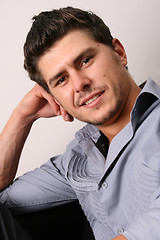 Image showing Friendly Male Model in Grey