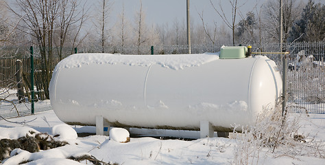 Image showing White propane gas tank in winter