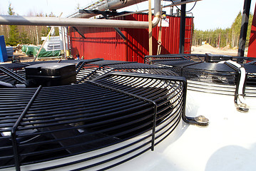 Image showing Industrial zone, Steel pipe-lines on blue sky