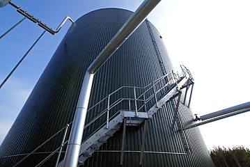 Image showing Industrial zone, Steel pipe-lines on blue sky