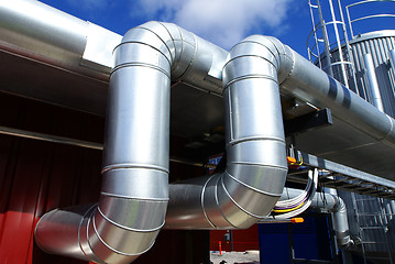 Image showing Industrial zone, Steel pipelines on blue sky 