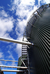 Image showing Industrial zone, Steel pipelines on blue sky 