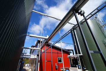 Image showing Industrial zone, Steel pipelines on blue sky