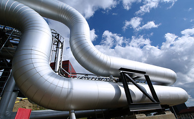 Image showing Industrial zone, Steel pipelines on blue sky