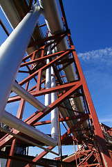 Image showing Industrial zone, Steel pipelines and support structures on blue 