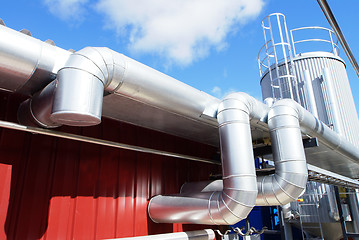 Image showing Industrial zone, Steel pipelines on blue sky