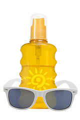 Image showing oil product, sun protection and sunglassses