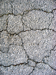 Image showing Cracks on asphalt background