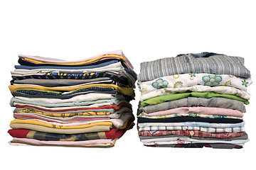 Image showing stack of colored t-shirts and shirt