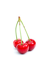 Image showing Three tasty cherries