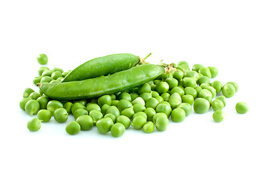 Image showing Pile of green peas and pair of pods 