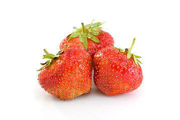 Image showing Three tasty ripe red strawberries