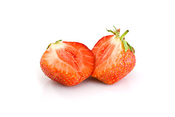 Image showing Tasty ripe red strawberry sliced on half