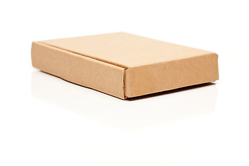 Image showing Closed Thin Cardboard Box on White