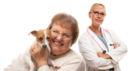 Image showing Happy Senior Woman with Dog and Veterinarian