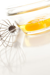 Image showing Hand Mixer with Eggs in Glass Bowl