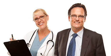 Image showing Smiling Businessman with Female Doctor or Nurse