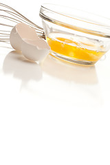 Image showing Hand Mixer with Eggs in Glass Bowl