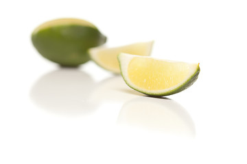 Image showing Sliced Lime on Reflective White Surface