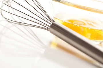 Image showing Hand Mixer with Eggs in Glass Bowl