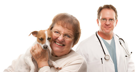 Image showing Happy Senior Woman with Dog and Male Veterinarian