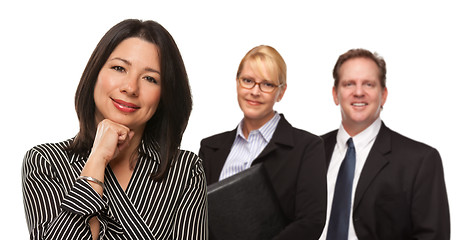 Image showing Hispanic Woman In Front of Businesspeople on White