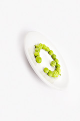 Image showing Fresh green peas on plate