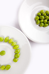Image showing Fresh green peas on plate