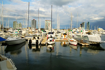 Image showing Marina Boats Against Towers