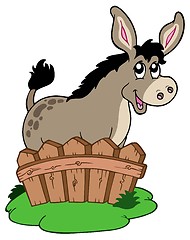 Image showing Cartoon donkey behind fence